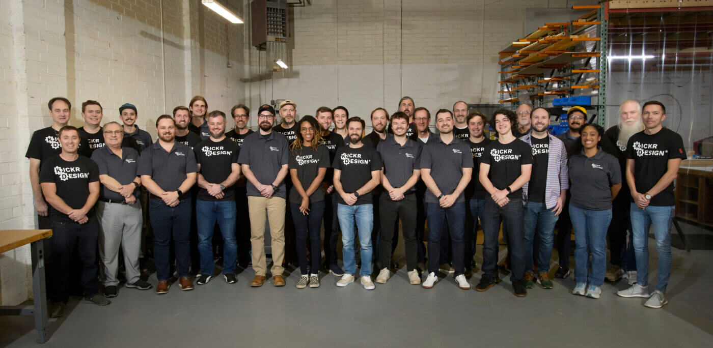 Kickr product development team with Kickr Design tshirts
