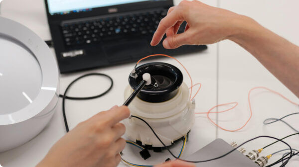 Design testing and validation engineer testing a product