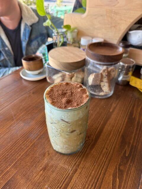 Iced coffee drink sitting on the counter at Coffee Box