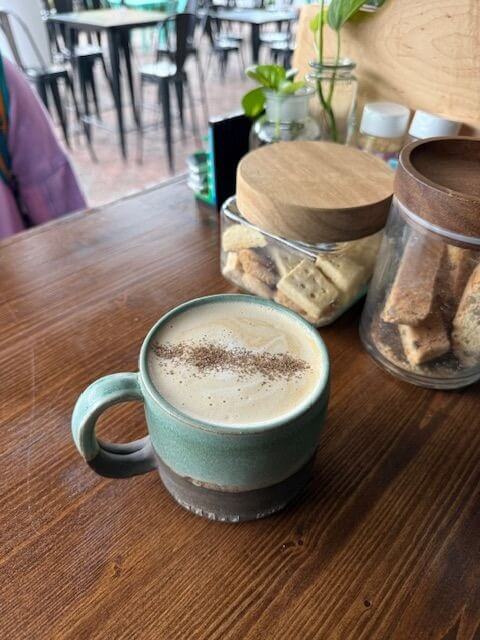 Mug of coffee sitting on the counter at Coffee Box