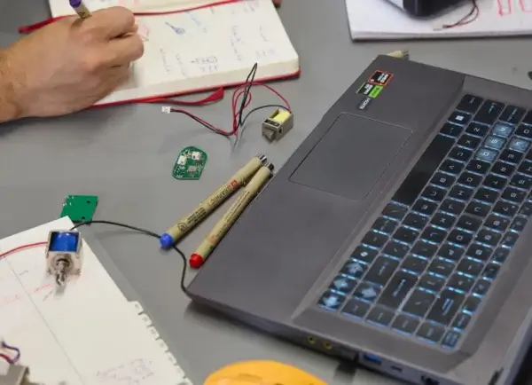 Kickr Labs Working at a Desk